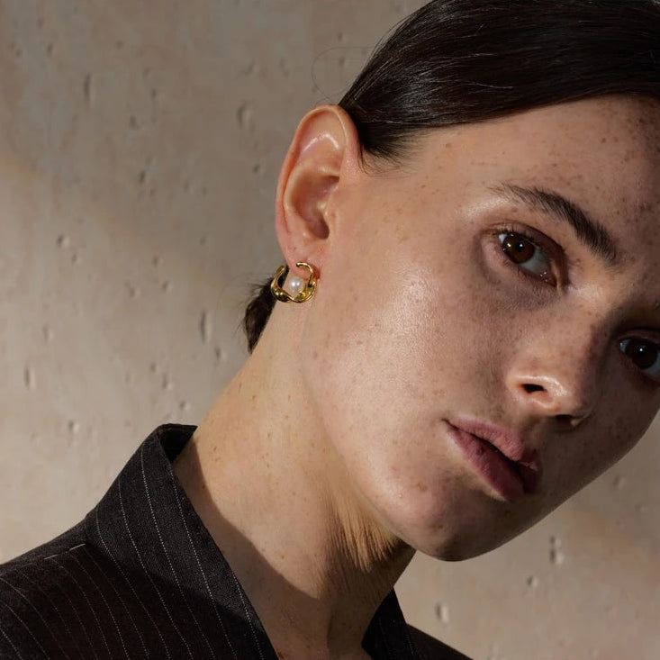 Brinco Vestígio em ouro 18K