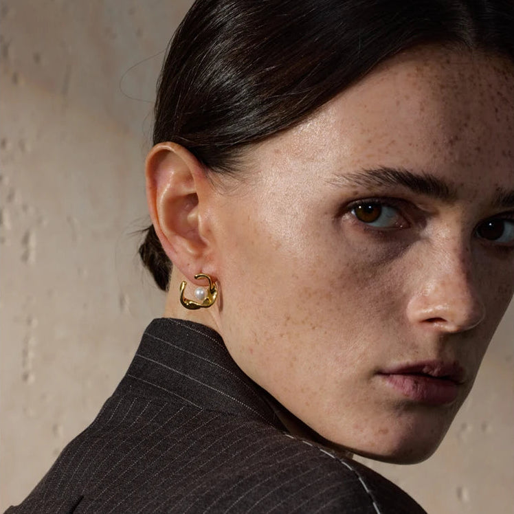 Brinco Vestígio em ouro 18K